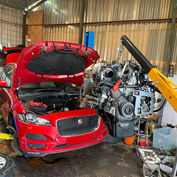 Jaguar F-Pace engine removal with hydraulic crane